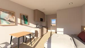 TV a/nebo společenská místnost v ubytování Hótel Stuðlagil Canyon