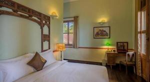 Ένα ή περισσότερα κρεβάτια σε δωμάτιο στο Le Relais de Chhlong +44 φωτογραφίες