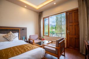 Ένα ή περισσότερα κρεβάτια σε δωμάτιο στο The Lhababs Ladakh +16 φωτογραφίες