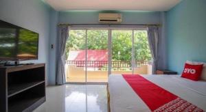 Μια τηλεόραση ή/και κέντρο ψυχαγωγίας στο OYO 384 Ban Sabaidee