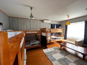 Una cama o camas en una habitación de Drive in Ichinomiya motel 131 fotos más