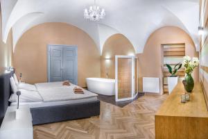 Katil atau katil-katil dalam bilik di Apartmany Chornitzeruv dum