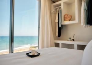 Ένα ή περισσότερα κρεβάτια σε δωμάτιο στο Ancón Suites