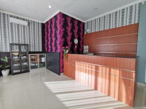 Kuchyň nebo kuchyňský kout v ubytování OYO 95059 Ikon Guesthouse