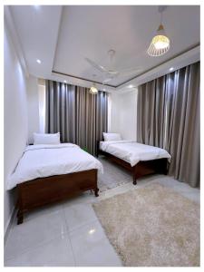 Postel nebo postele na pokoji v ubytování kisumu 3bedrooms