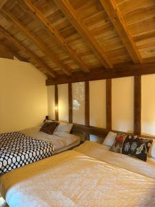 Ένα ή περισσότερα κρεβάτια σε δωμάτιο στο The Bath and Bed Tateyama