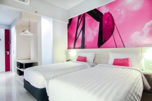 Letto o letti in una camera di favehotel Sudirman Bojonegoro