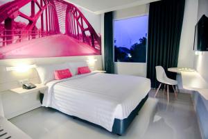Letto o letti in una camera di favehotel Sudirman Bojonegoro
