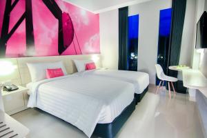 Letto o letti in una camera di favehotel Sudirman Bojonegoro