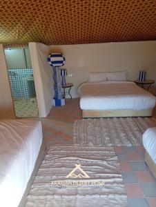 Ένα ή περισσότερα κρεβάτια σε δωμάτιο στο Arabian Desert Home