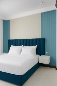 Ένα ή περισσότερα κρεβάτια σε δωμάτιο στο Hotel I