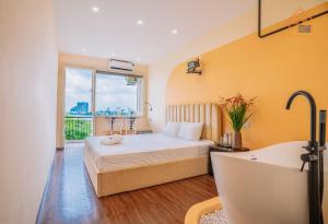 Postel nebo postele na pokoji v ubytování An Homestay Lakeview Apartment + 84 fotografií