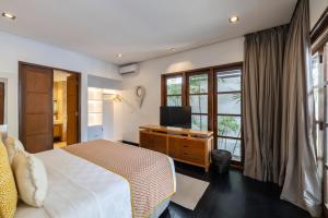 TV a/nebo společenská místnost v ubytování Villa Dee 6