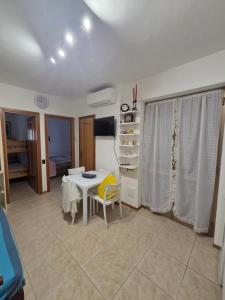 Et tv og/eller underholdning på Casa vacanze il tramonto vasto marina