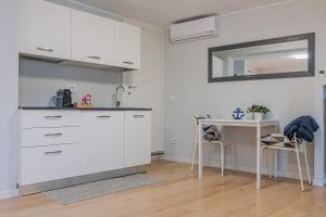 Η κουζίνα ή μικρή κουζίνα στο Bellano Holidays - Casa Ortensia