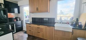 O bucătărie sau chicinetă la Special View Paris & La Défense