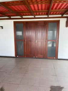 ゴールにあるMilano Apartment & Roomsの木戸一列