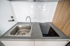 Η κουζίνα ή μικρή κουζίνα στο Charming 1-Bed Apt (T3- 629) +4 φωτογραφίες