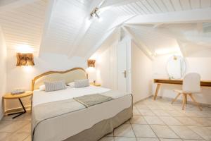 Postel nebo postele na pokoji v ubytování Spiros Family Apts