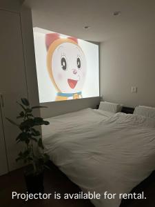 Postel nebo postele na pokoji v ubytování NK Comfort Villa BEPPU