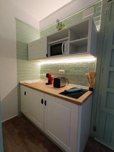 Nhà bếp/bếp nhỏ tại Prieto Picudo - Harbor's Light +4 ảnh