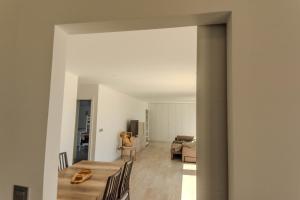 a room with a table and chairs and a living room at Villa Mare in Teguise +31 photos