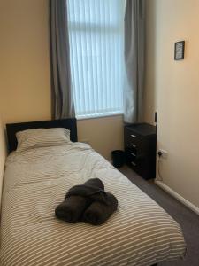 Postel nebo postele na pokoji v ubytování Morecambe apartments