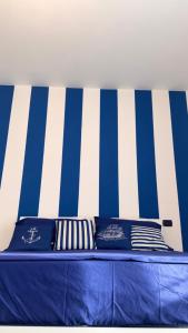 Ένα ή περισσότερα κρεβάτια σε δωμάτιο στο BEB Satriani Room +29 φωτογραφίες