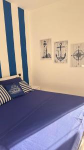 Postel nebo postele na pokoji v ubytování BEB Satriani Room