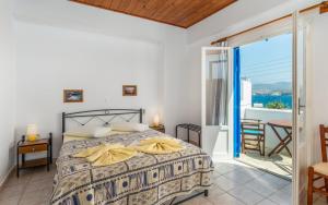 Ένα ή περισσότερα κρεβάτια σε δωμάτιο στο Apollon Rooms 2