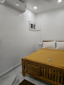 Ένα ή περισσότερα κρεβάτια σε δωμάτιο στο LS residency