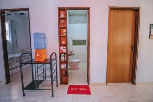 a room with a room with a door and a room with a room at Doce Lar São Francisco in Cabo de Santo Agostinho +30 photos