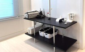 a black table with items on it in a room at Stay in Seoul, 3 min to Seoul Station, New Apt, 3 Air Conditioners, Elevator, Rooftop, Quiet & Cozy in Seoul