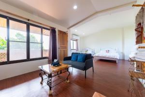 Postel nebo postele na pokoji v ubytování 宜蘭閑居民宿