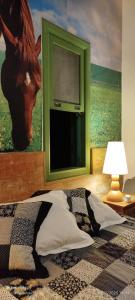 Ένα ή περισσότερα κρεβάτια σε δωμάτιο στο Quarto com suite no Rancho São Francisco de Assis