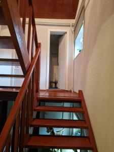 a staircase in a house with a glass floor at Brīvdienu māja Vecdaugavā in Riga +3 photos