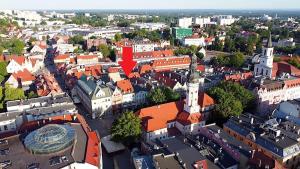 an aerial view of a city with a red roof at Apartament na Starym Mieście Lisowskiego in Zielona Góra