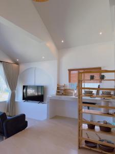 En eller flere senge i et værelse på Chaloklum Bay Resort - Tranquility Seahouse 105