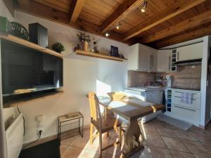 Η κουζίνα ή μικρή κουζίνα στο Superbe appt duplex 4pers - Bourg Saint Maurice