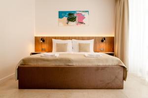 Ένα ή περισσότερα κρεβάτια σε δωμάτιο στο FiVe Penzion +58 φωτογραφίες