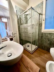 a bathroom with a shower and a sink at Angy's House in Verona +12 photos
