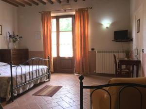 Posteľ alebo postele v izbe v ubytovaní Agriturismo Marinello