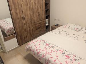 Ένα ή περισσότερα κρεβάτια σε δωμάτιο στο Elinor's Secret Suite