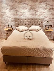 Ένα ή περισσότερα κρεβάτια σε δωμάτιο στο Histoire D'O