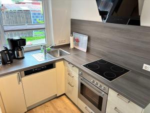 Кухня или мини-кухня в Ferienwohnung Krabbe am Wattenmeer
