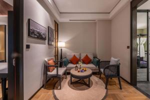 Posezení v ubytování Qingdao Xinduxin Manxin Hotel