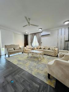 Χώρος καθιστικού στο ABUCHO Holiday Homes - Ras Al Khaimah UAE