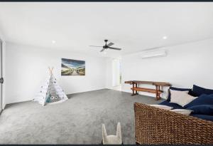 Khu vực ghế ngồi tại Beach Escape with Heated Pool and Coastal Comfort