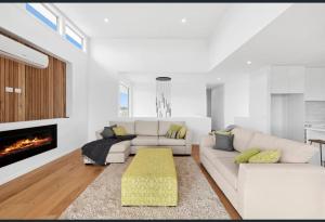 Khu vực ghế ngồi tại Beach Escape with Heated Pool and Coastal Comfort +1 ảnh