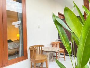 Giường trong phòng chung tại Lumbung Guesthouse Canggu